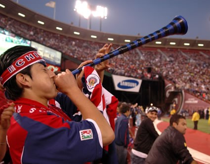 Chivas Fan Blows a Horn