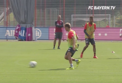 Lahm Shielding the Soccer Ball