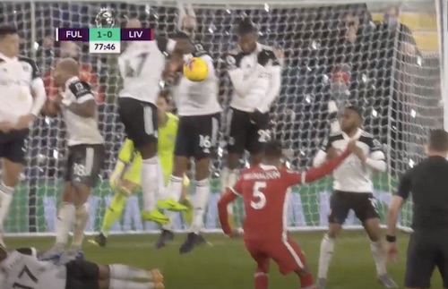 Fulham Player Lies Down Behind Wall