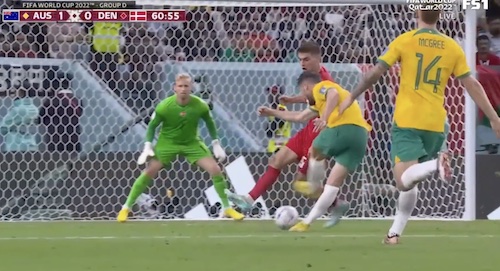 Through Denmark defender's legs